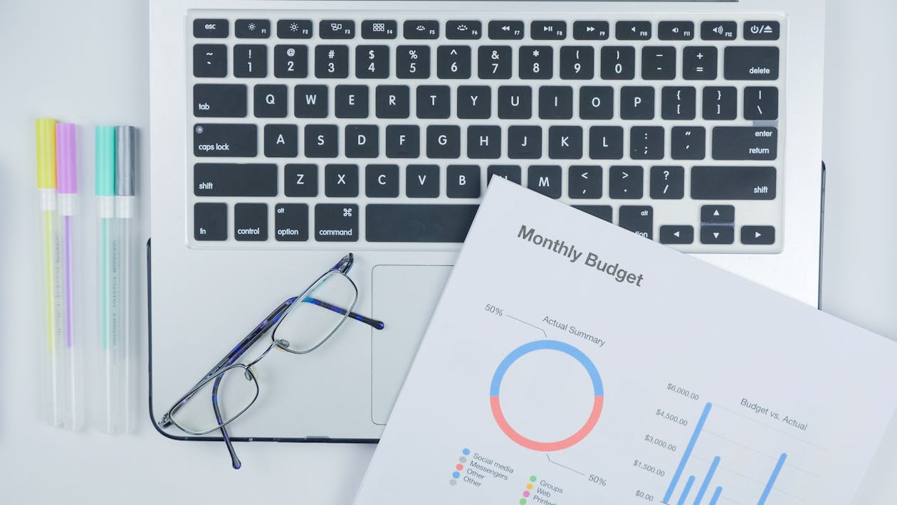 User reviewing a monthly budget to plan a budget streaming setup under 50.